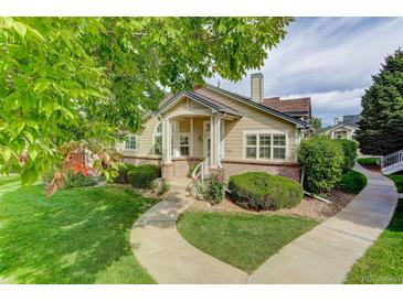 Charming single-Gathering home with a well-manicured lawn and a welcoming entrance at 18324 E Bethany Pl, Aurora, CO 80013