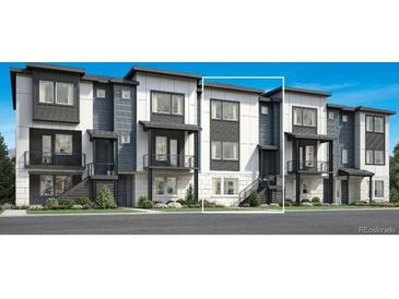 Modern townhome featuring a stylish facade and inviting entrance at 634 Saddle Dr, Erie, CO 80516