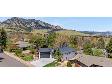 Stunning home with mountain views, a modern two-car garage, and beautifully landscaped surroundings at 2665 Juilliard St, Boulder, CO 80305