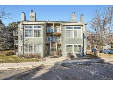 Multi-Gathering home with decks, stairs, and well-maintained landscaping at 868 S Reed Ct # H, Lakewood, CO 80226