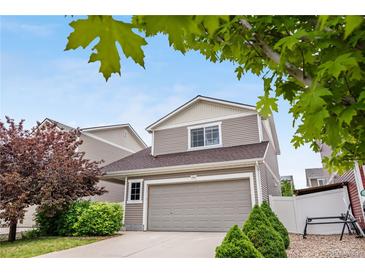 Charming two-story home featuring a spacious two-car garage and well-maintained landscaping at 5536 Kirk St, Denver, CO 80249