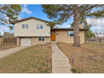Charming split-level home with brick and siding, mature tree, and attached single-car garage at 80 S 38Th St, Boulder, CO 80305