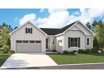 Charming single-story home with a two-car garage, attractive landscaping, and appealing curb appeal at 5546 Tamarack Ave, Firestone, CO 80504