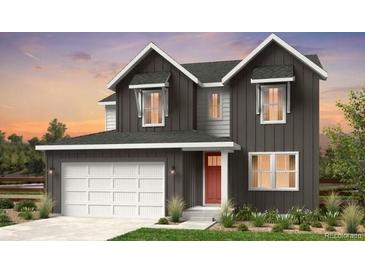 Charming two-story home showcasing a modern design, attached two car garage, and manicured landscaping at 4284 Ridgewalk Pt, Castle Rock, CO 80108