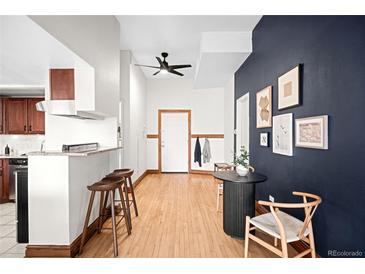 Elegant entryway boasting hardwood floors, and stylish decor elements for a welcoming ambiance at 2351 Federal Blvd # 102, Denver, CO 80211