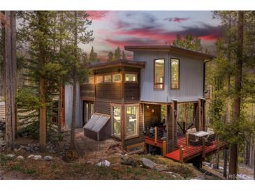 Unique contemporary home with mixed materials and deck in wooded setting at 167 Independence Cir, Breckenridge, CO 80424