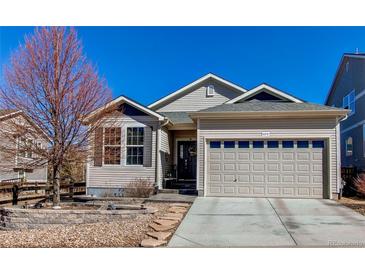 Charming single-Gathering home with a well-maintained lawn and a two-car garage at 3375 Starry Night Loop, Castle Rock, CO 80109