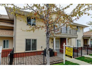 Charming two-story home featuring a fenced patio and balcony, creating inviting outdoor spaces at 7450 Lowell Blvd # B, Westminster, CO 80030