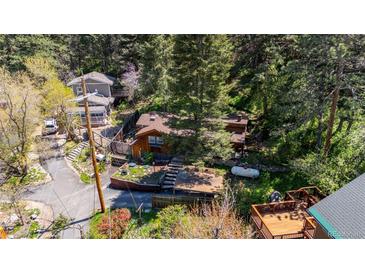 Charming mountain home with a terraced front yard and wood accents at 41 Silver Spruce, Boulder, CO 80302