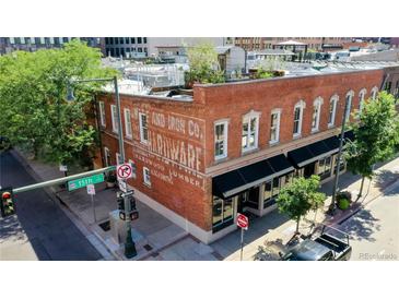 Charming brick building exterior with classic architectural details and street view at 1510 Wazee St # 3, Denver, CO 80202