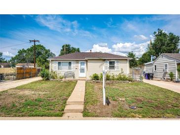 Charming single-story home featuring a well-maintained lawn and inviting curb appeal at 3125 W Ford Pl, Denver, CO 80219