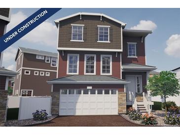 Charming under-construction home with a two-car garage, brick driveway, and neutral color palette at 1193 Highview Ln, Erie, CO 80516