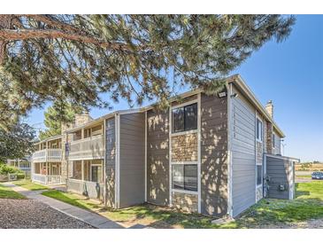 Charming condo building featuring wood and stone accents plus private balconies at 18193 E Kentucky Ave # 203, Aurora, CO 80017