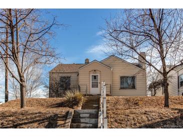 Cute bungalow with front steps and small yard at 2600 S Downing St, Denver, CO 80210