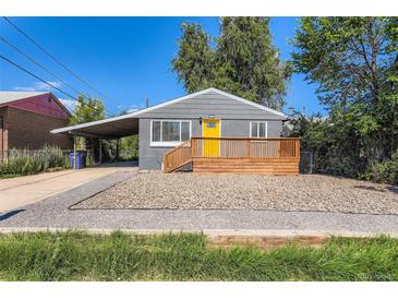 Charming single-story home featuring a new wooden porch and bright yellow front door at 695 S Quitman St, Denver, CO 80219