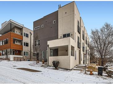 Modern multi-level home showcasing a contemporary design, neutral tones, and a welcoming front entrance at 1246 Xavier St, Denver, CO 80204