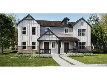 Charming modern farmhouse with brick accents, a welcoming front porch, and well-manicured landscaping at 15268 Detroit St, Thornton, CO 80602