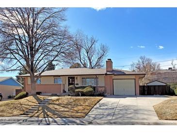 Charming single-Gathering home with a well-maintained front yard and a classic suburban appeal at 12060 W Carolina Dr, Lakewood, CO 80228