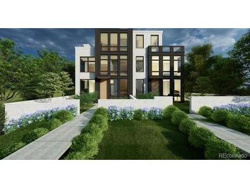 Stunning modern home featuring a black and white exterior, large windows and a meticulously landscaped front yard at 203 Garfield St, Denver, CO 80206