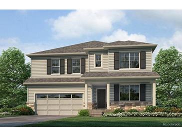 Charming two-story home with a neutral palette and a well-maintained front yard, promising curb appeal at 18399 Field Mint Pt, Parker, CO 80134