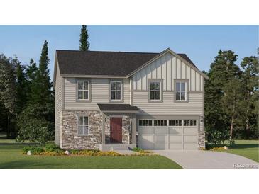 Charming two-story home with stone accents, gray siding, and a two-car garage on a well-maintained lot at 15254 Milwaukee St, Thornton, CO 80602