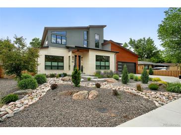 Charming two-story home with modern architecture and xeriscaped front yard at 2635 Pierce St, Wheat Ridge, CO 80214