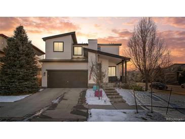 Modern two-story house with attached garage at 17826 E 107Th Way, Commerce City, CO 80022