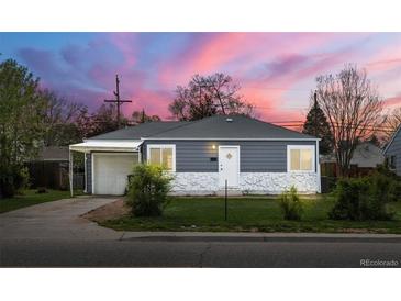 Charming single story home featuring a carport and well-maintained front yard at 2205 S Irving St, Denver, CO 80219
