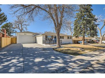 Charming single-Gathering home featuring a well-maintained lawn and inviting curb appeal at 8985 Lander St, Westminster, CO 80031