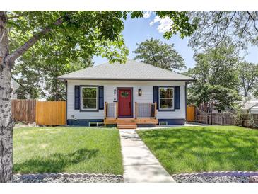 Charming single-story home with a red front door, fresh grass, and a sidewalk leading to the entrance at 4818 Bryant St, Denver, CO 80221