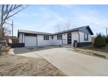 Newly renovated ranch home with modern exterior and attached garage at 190 W 1St Ave, Broomfield, CO 80020