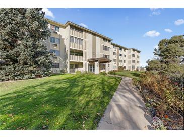 Attractive building exterior with landscaping and walkway at 595 S Alton Way # 5D, Denver, CO 80247