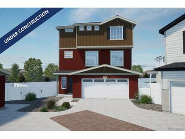 Two-story home with attached garage and landscaping at 22042 E 38Th Pl, Aurora, CO 80019