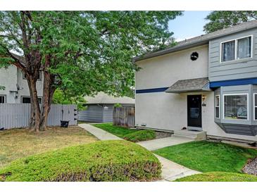 Charming home featuring a well-maintained yard and inviting entryway; perfect for suburban living at 2213 Emery St # C, Longmont, CO 80501