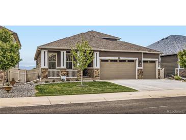 Charming single-Gathering home with a well-maintained lawn and inviting two-car garage at 8953 Falcon St, Firestone, CO 80504