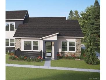 Charming single-story home with stone accents and a well-maintained front yard at 2491 W 69Th Pl, Denver, CO 80221