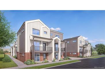 Modern two-story townhouses with brick and siding exteriors at 4537 Tabor St, Wheat Ridge, CO 80033