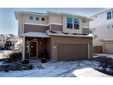 Charming two-story home featuring an attached garage and a welcoming front entrance at 2848 Merry Rest Way, Castle Rock, CO 80109