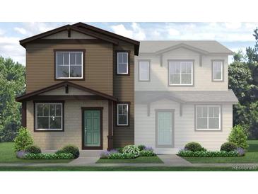 Charming two-story home with a green front door, neat landscaping, and neutral tones at 1454 Coral Pl, Longmont, CO 80504
