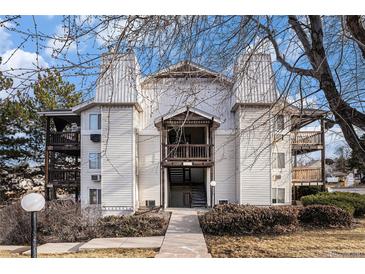 A charming exterior elevation features attractive architecture and well-maintained landscaping at 17505 E Mansfield Ave # 1411L, Aurora, CO 80013