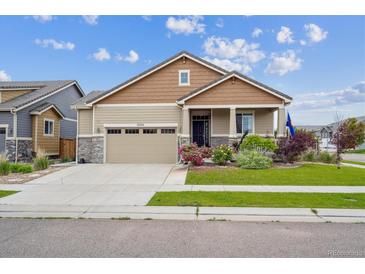 Charming single-Gathering home with a two-car garage and well-maintained landscaping at 15524 E 115Th Ave, Commerce City, CO 80022