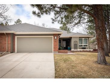 Charming single Gathering home with a two-car garage and mature trees in a quiet neighborhood at 3 Pinyon Pine Rd, Littleton, CO 80127