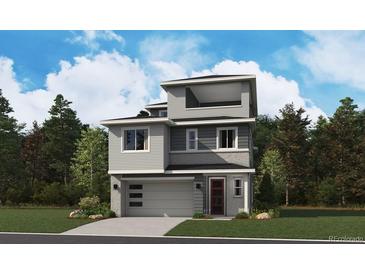 Modern three-story home with gray siding, two-car garage, and rooftop deck at 8498 Eagle River St, Littleton, CO 80125