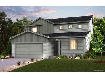 Charming two-story home with a beautifully landscaped yard, a covered porch, and a two-car garage at 14160 Bunny Hop Ln, Parker, CO 80134