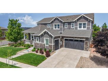 Beautiful two-story home with stone accents, manicured lawn and attached two car garage at 3891 W 149Th Ave, Broomfield, CO 80023
