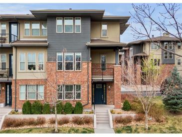 Stylish modern townhome featuring brick facade and large windows at 188 S Locust St, Denver, CO 80224