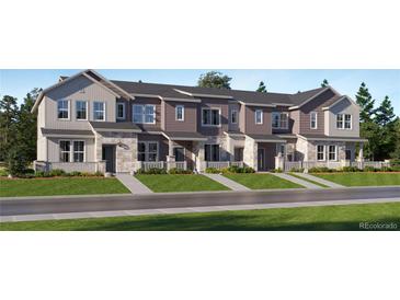 Charming townhomes feature modern architecture, complemented by well-maintained landscaping for enhanced curb appeal at 2012 S Haleyville Way, Aurora, CO 80018