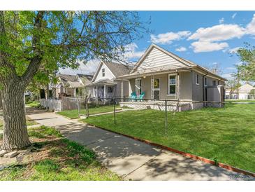 Charming single-Gathering home with a well-manicured lawn and inviting curb appeal at 4353 Sherman St, Denver, CO 80216
