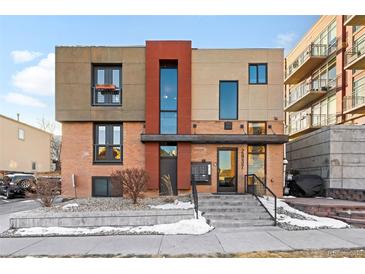 Modern two-story building with attractive exterior finishes and landscaping at 2837 Vallejo St # 108, Denver, CO 80211