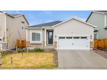 Charming single Gathering home featuring a 2-car garage and neutral toned exterior in an inviting community at 17801 E 95Th Pl, Commerce City, CO 80022